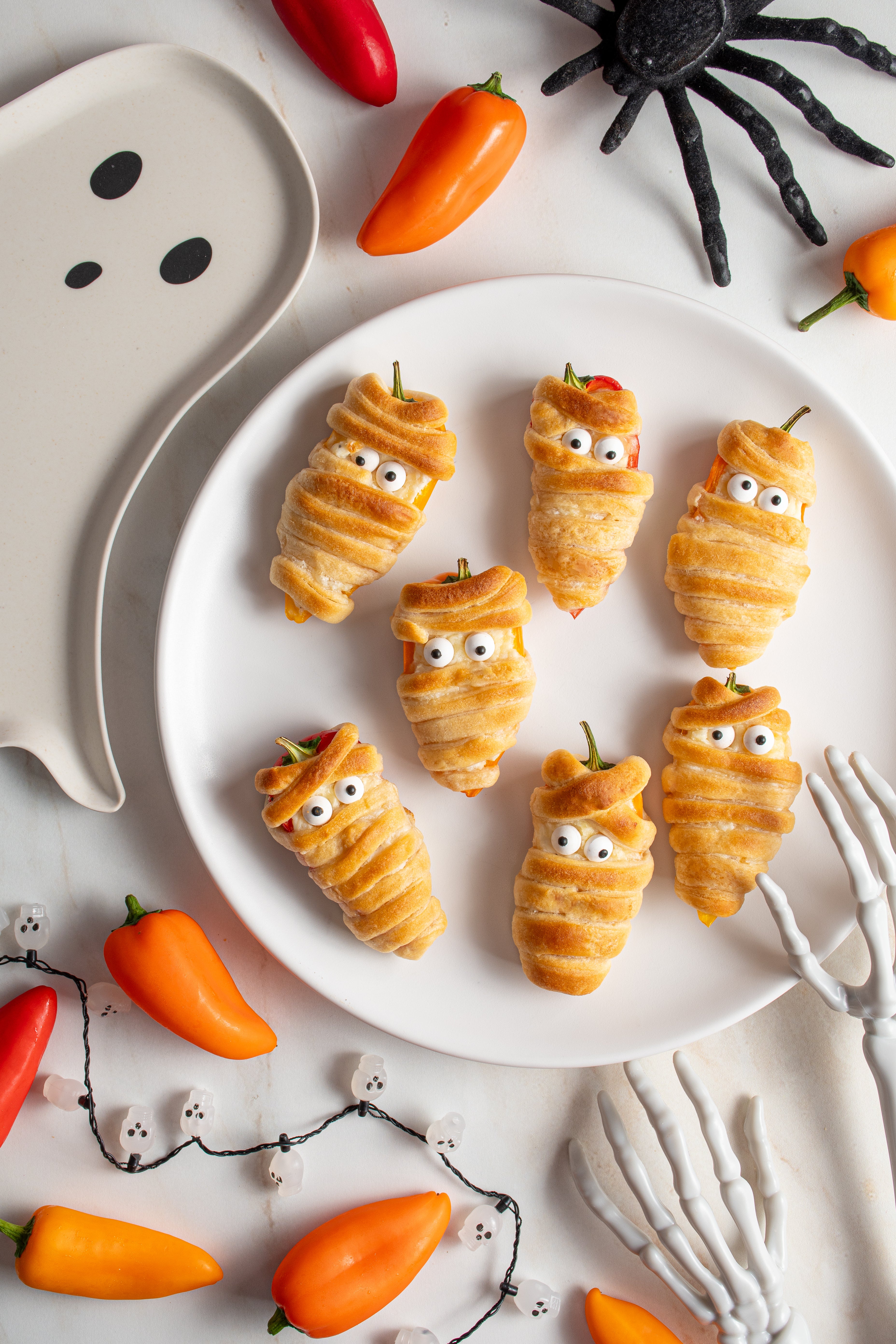 Halloween-themed snack on a plate with decorative elements.